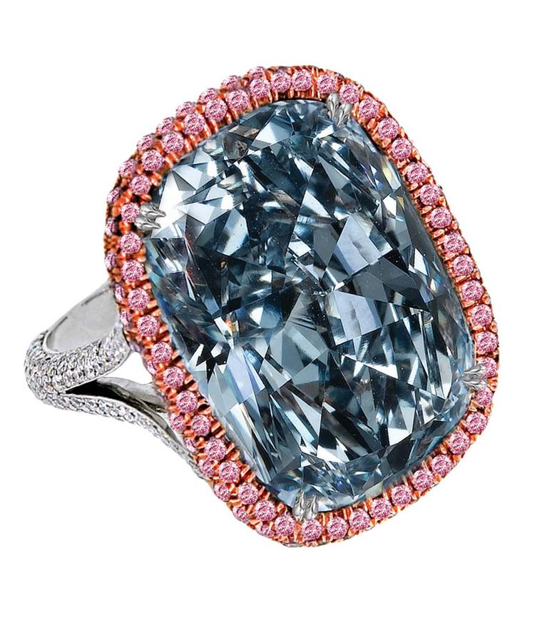 Jacob & Co. blue diamond ring featuring a 30.11ct natural Fancy blue grey cushion-cut diamond, framed by micro pavé-set round brilliant white diamonds and mounted in platinum.